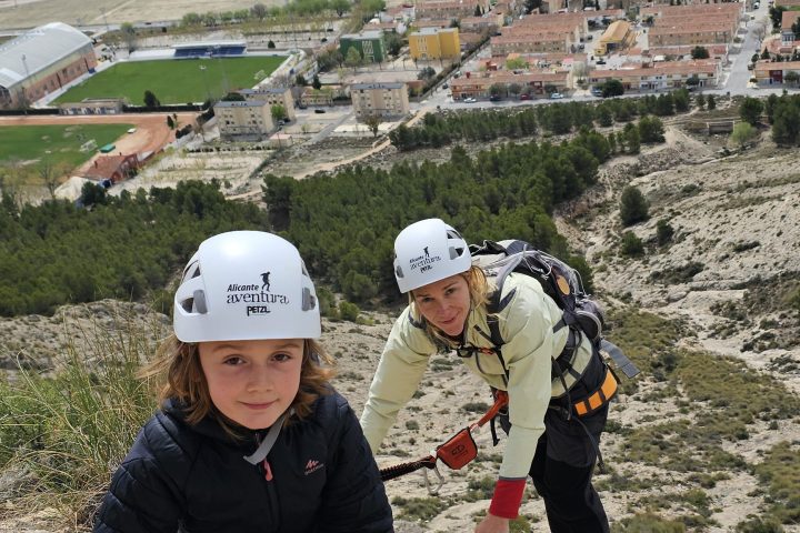 a man riding on top of a mountain