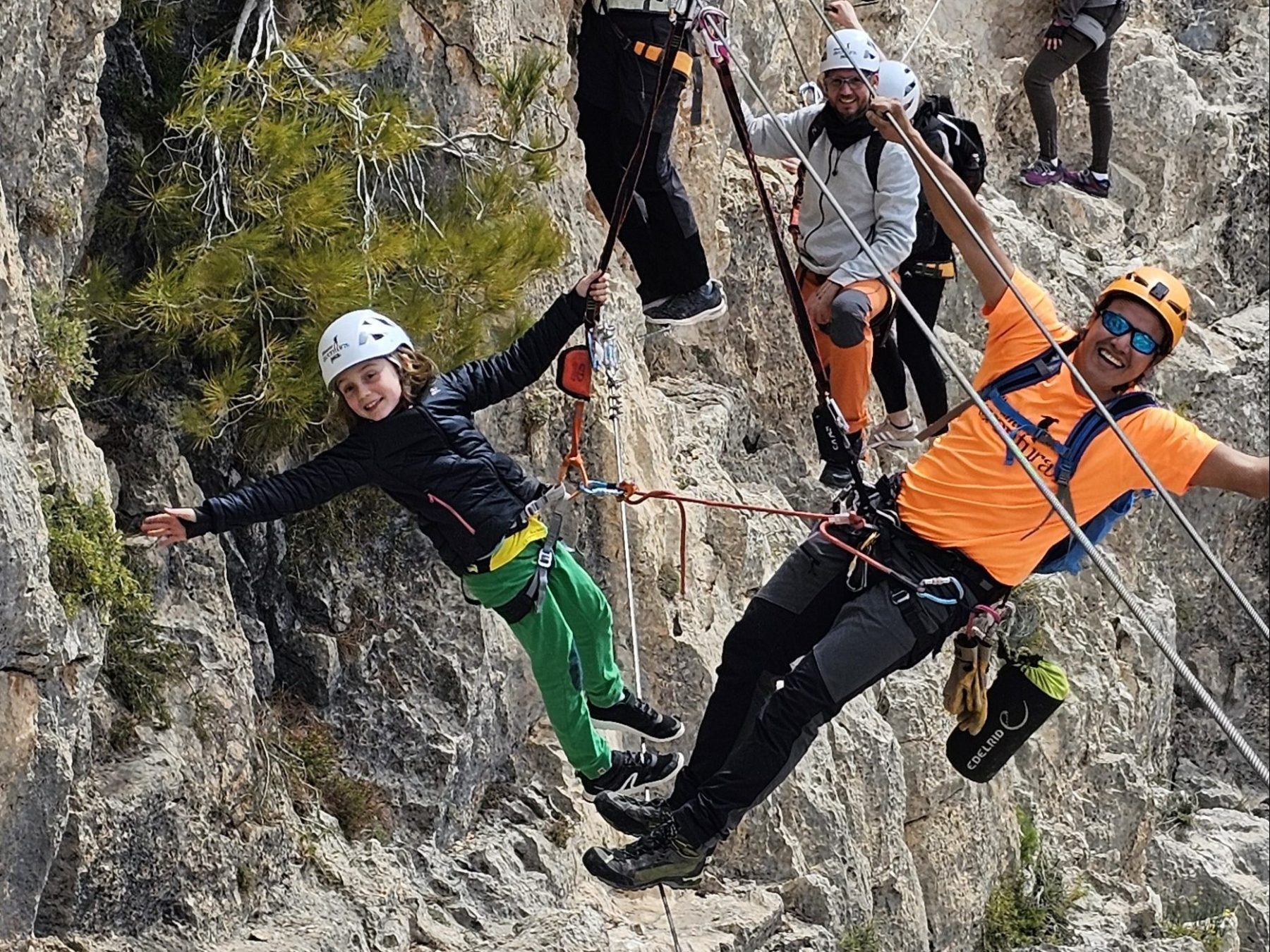 a man standing on a rocky hill