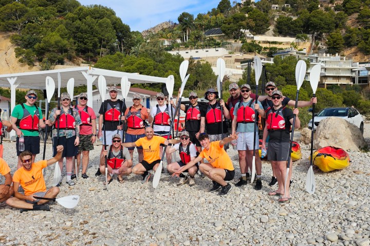 a group of people posing for the camera