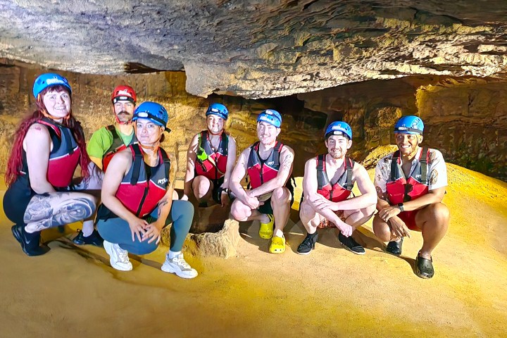 a group of people posing for the camera