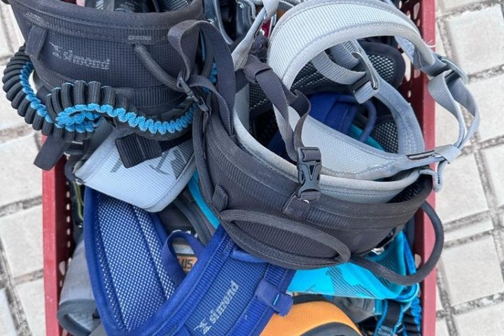 a bag of luggage sitting on top of a chair