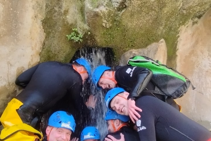 a group of people swimming in the water