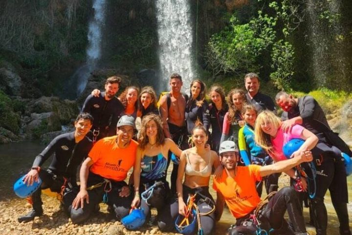 a group of people posing for the camera