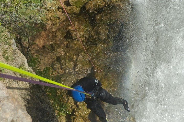 a person flying through the air while riding skis
