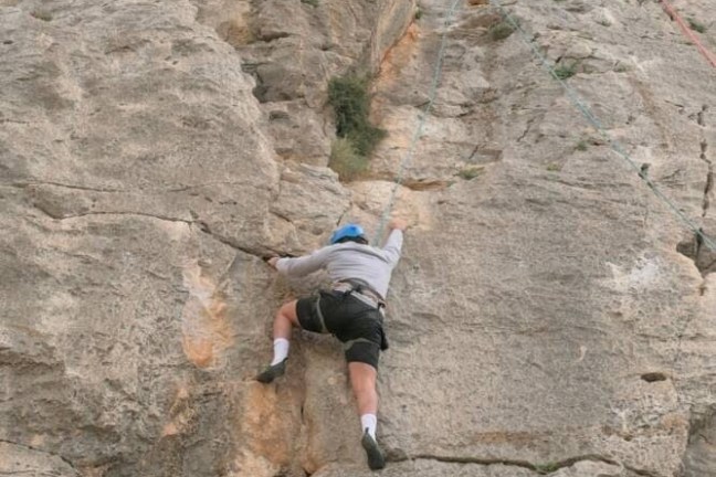 a man in a rocky area