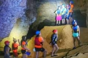 a group of people around each other