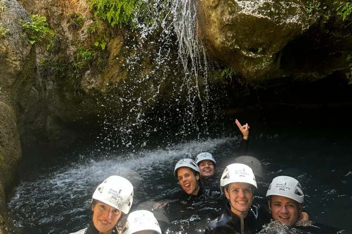 a group of people in the water