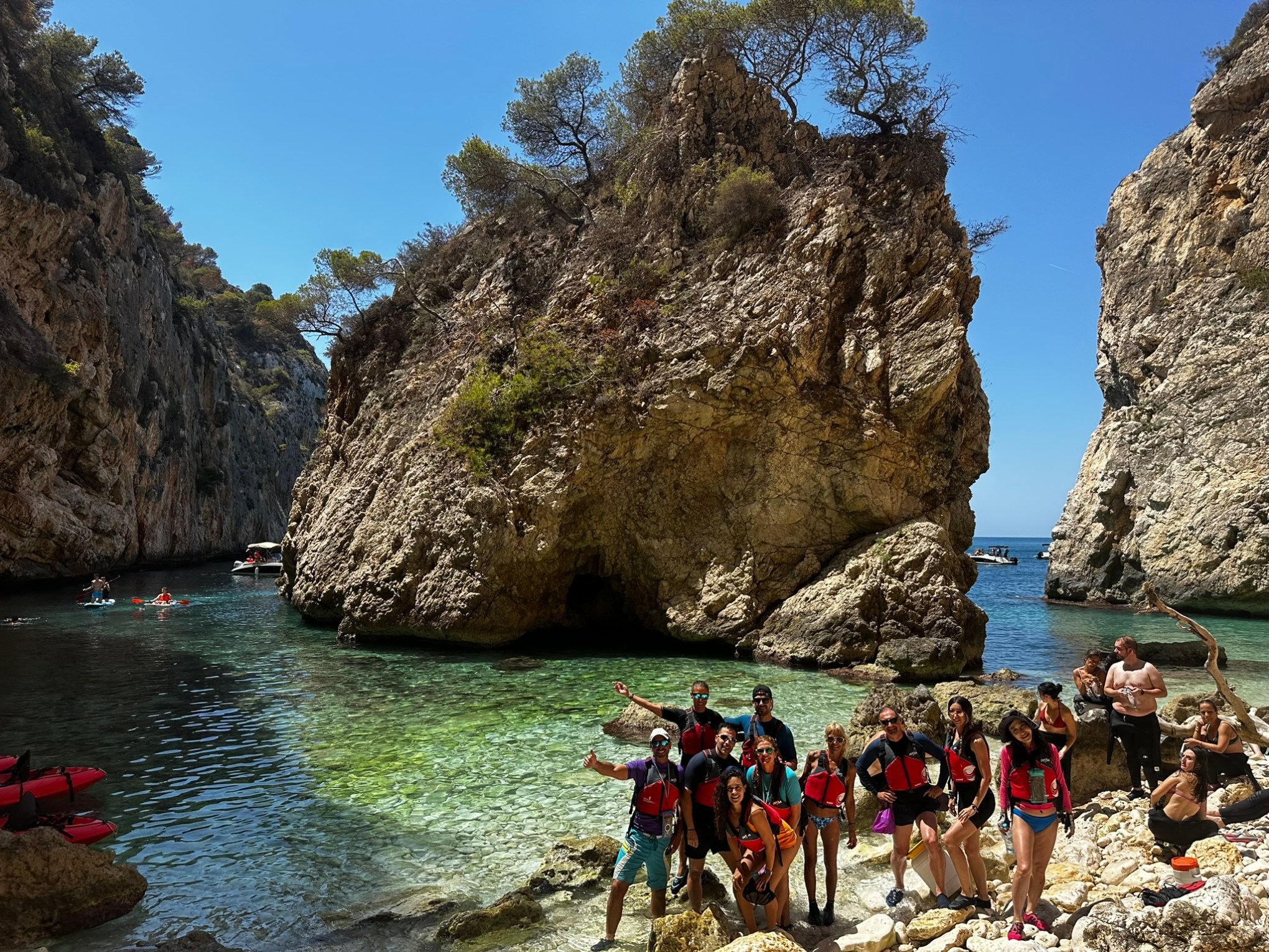 a group of people swimming in a body of water