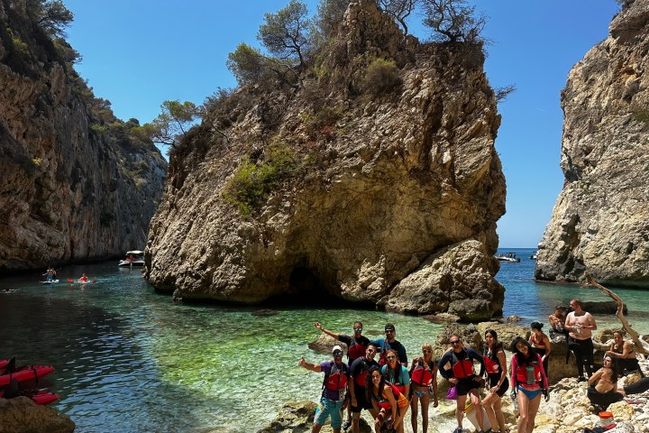 a group of people swimming in a body of water
