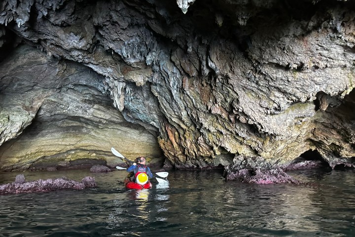 a small boat in a body of water