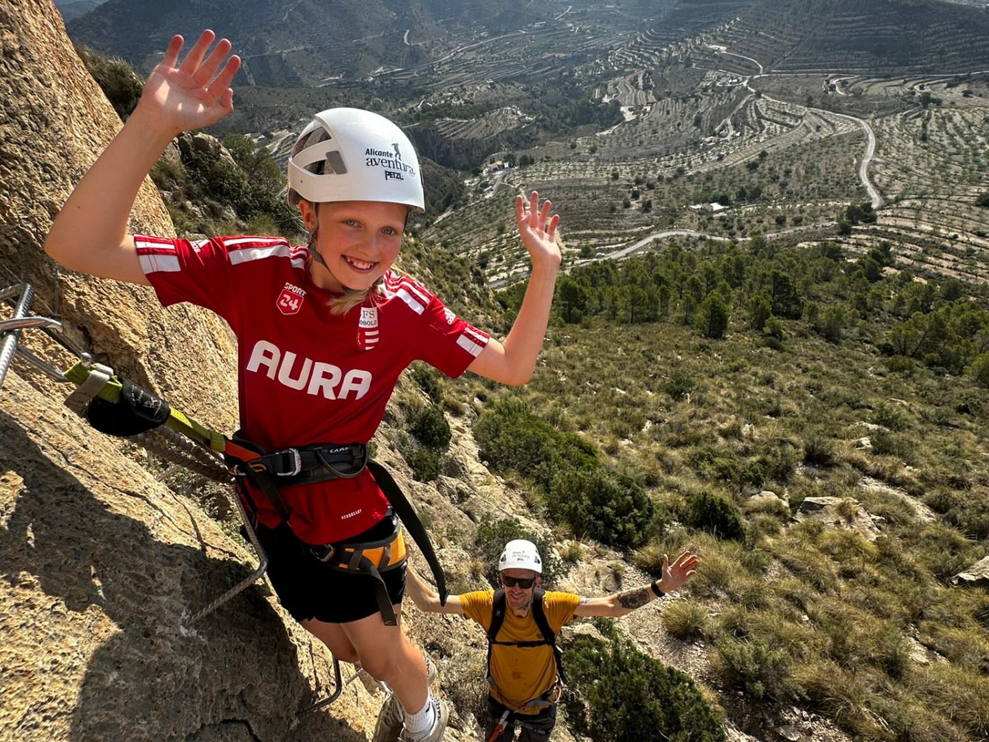 a man standing on top of a mountain