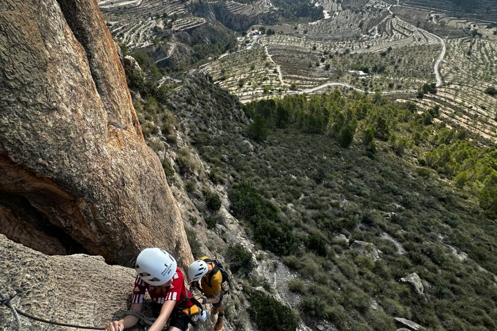 a man riding on top of a mountain