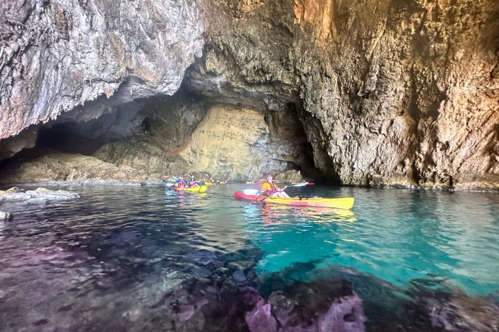 a close up of a large rock in a pool of water