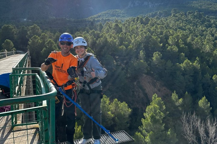 a man riding on top of a mountain