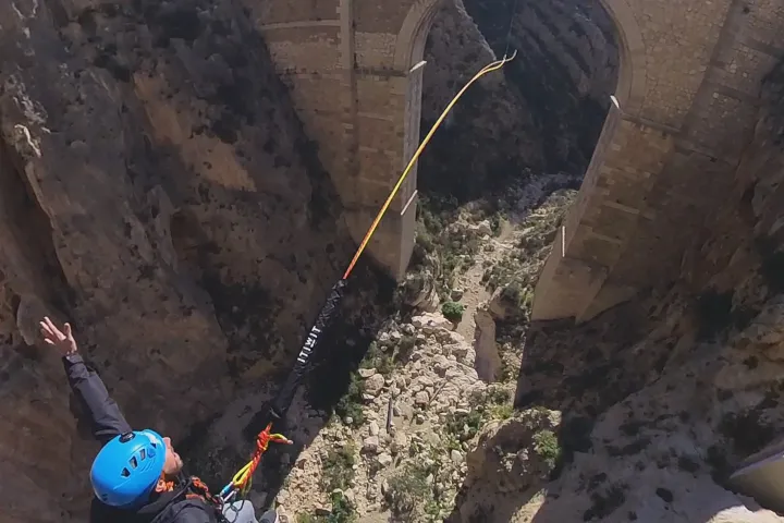 a man standing on a rock