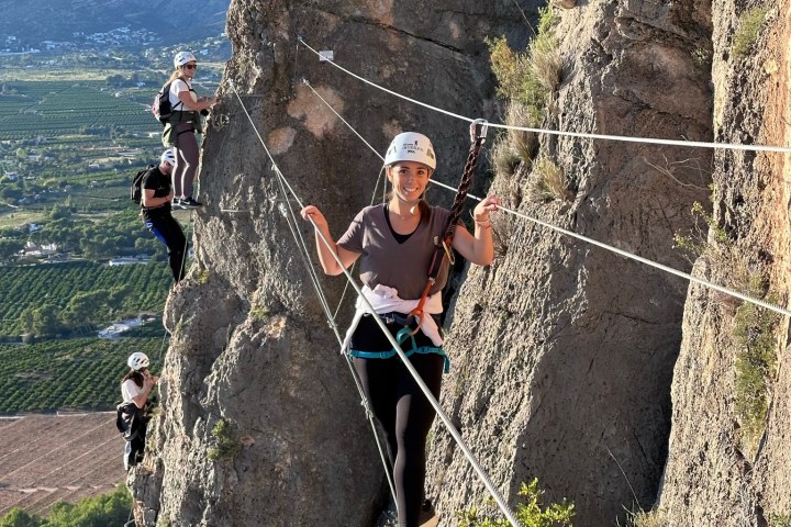 a person standing in front of a mountain