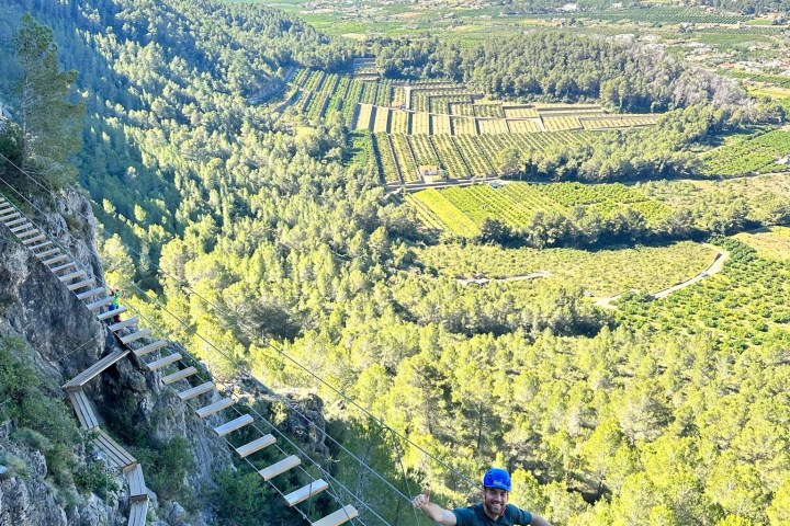 a man riding on top of a mountain