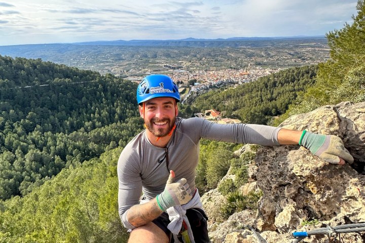 a man standing on top of a mountain