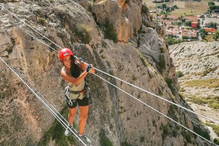 a person standing on a rocky hill