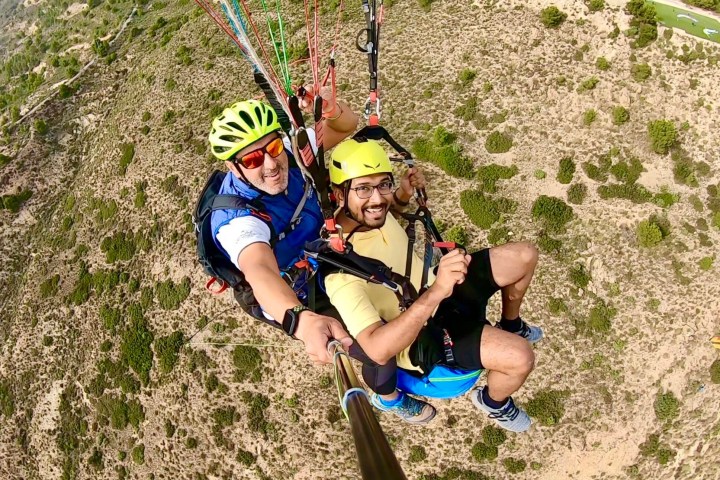 a young child riding on top of a mountain