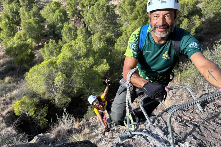 Yasser Arafat riding on top of a rock