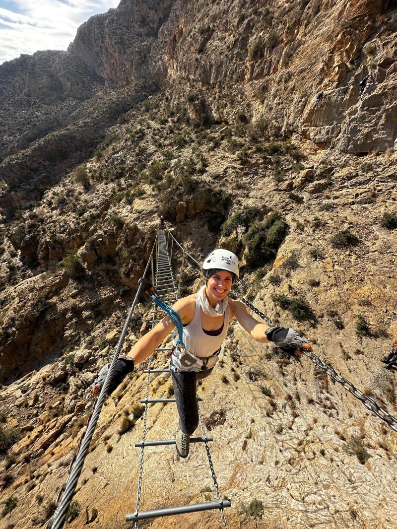 a man riding on top of a mountain