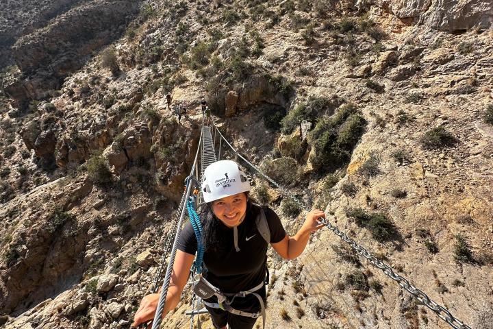 a man riding on top of a mountain