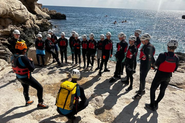 a group of people on a beach
