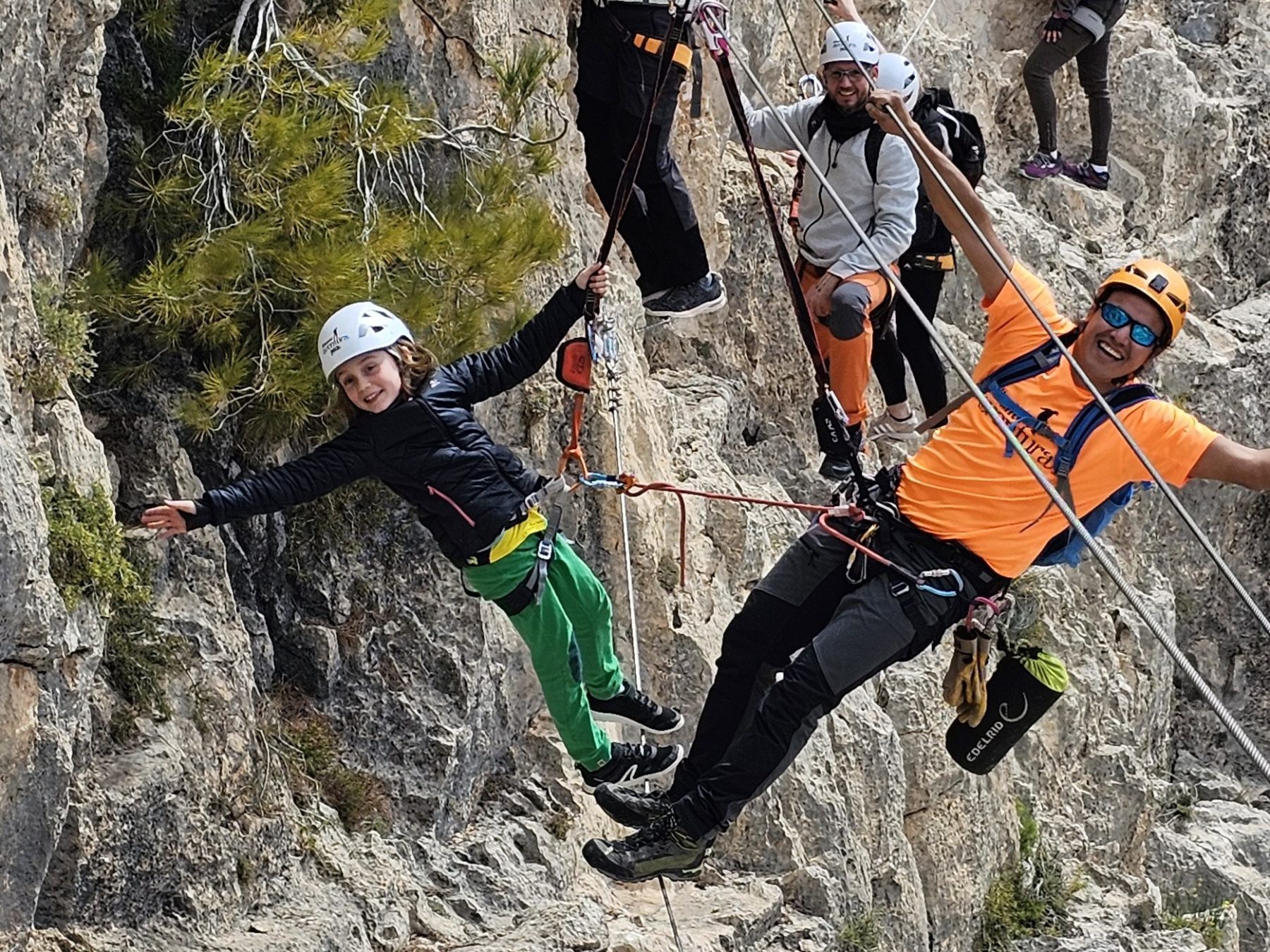 a man standing on a rocky hill