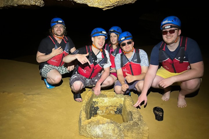 a group of people posing for the camera
