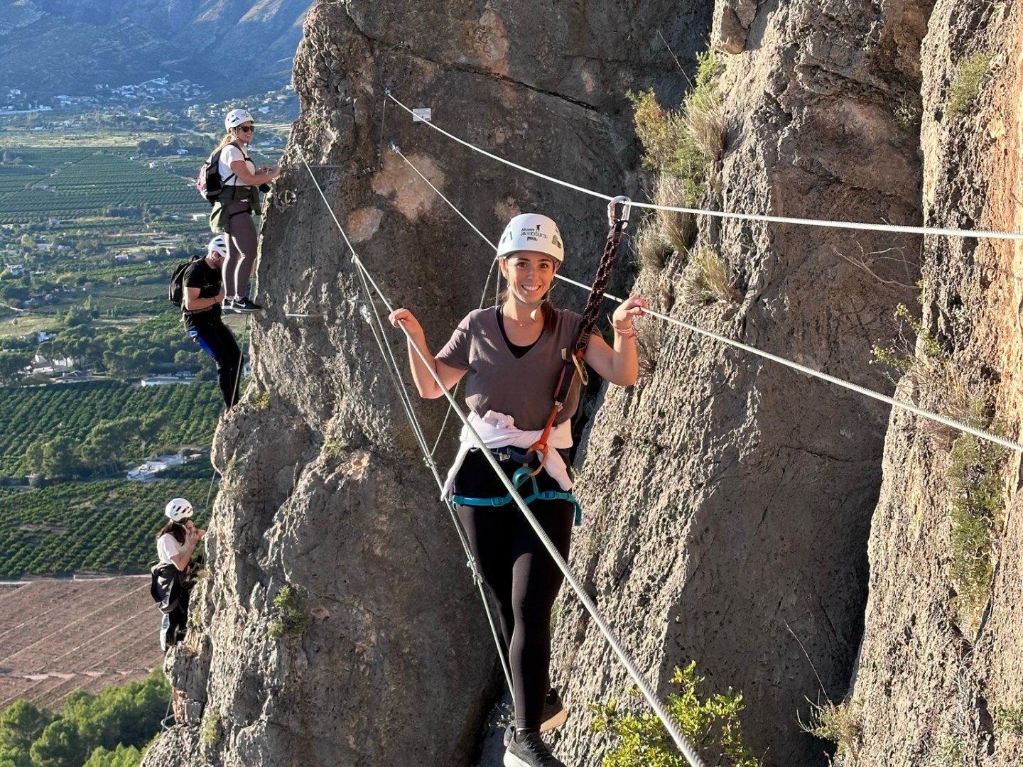 a person standing in front of a mountain