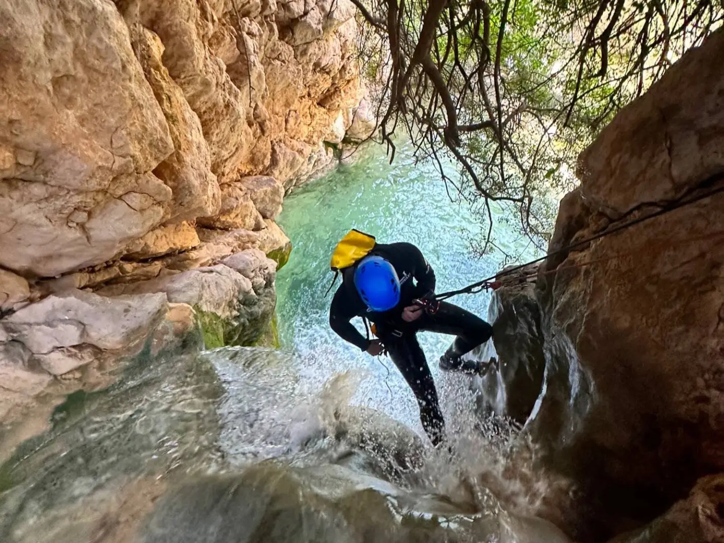 a person sitting on a rock