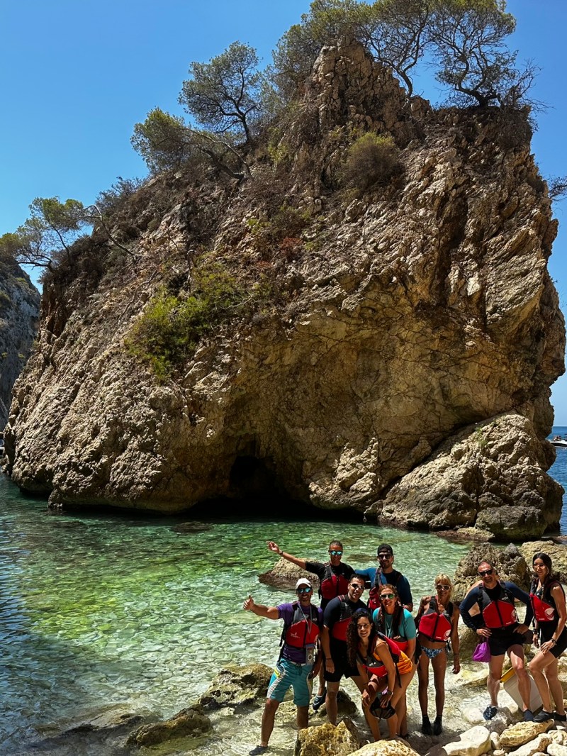 a group of people swimming in a body of water