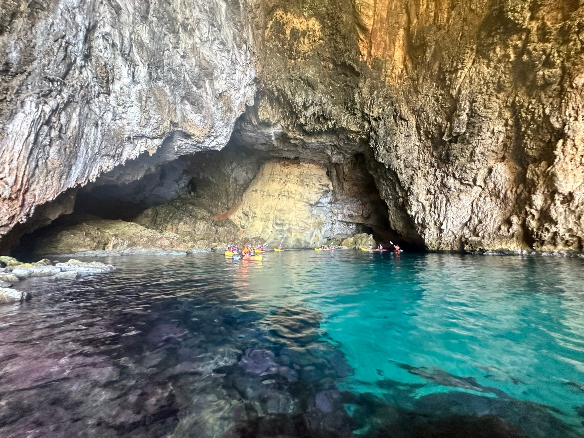 a large rock in a pool of water