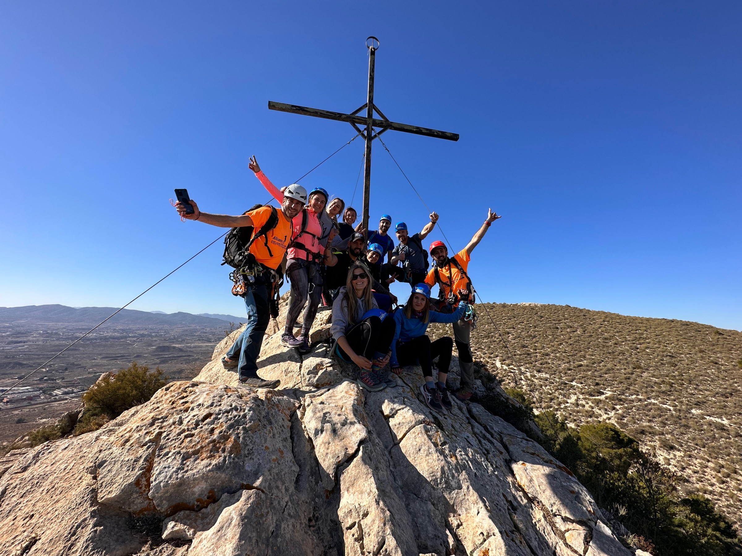 a man doing a trick on a rocky hill