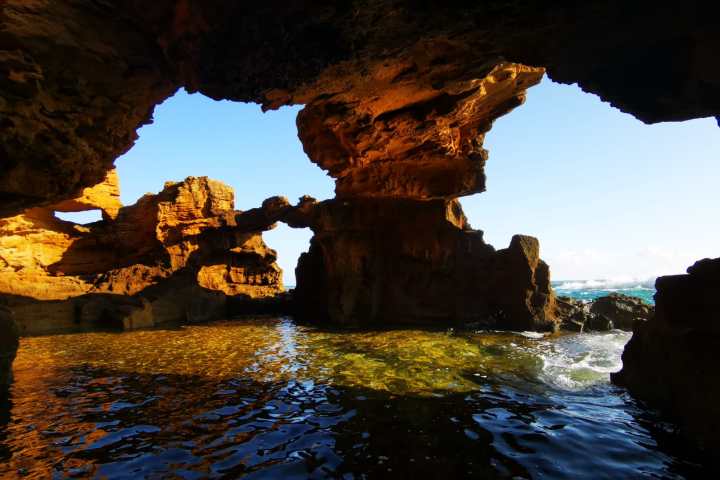 a sunset over some water