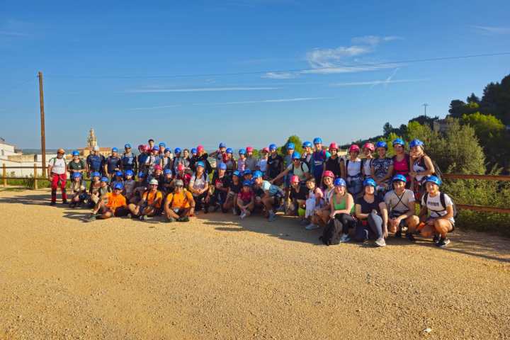 a group of people on a beach