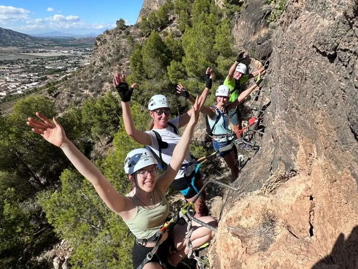 a man standing on a rocky hill