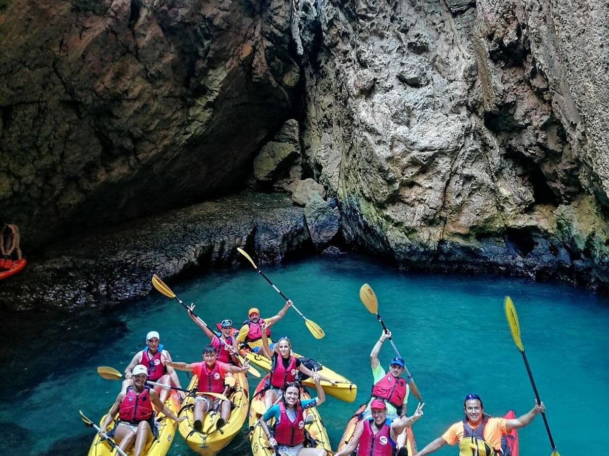 a group of people on a raft in the water