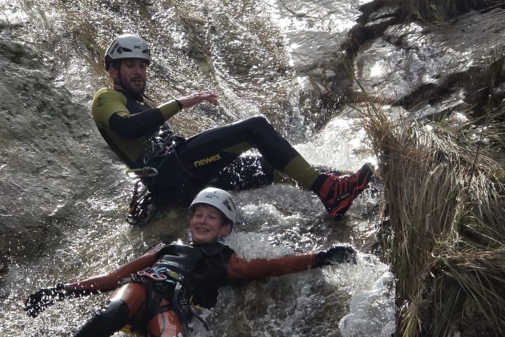 a man riding a wave on a surfboard in the water