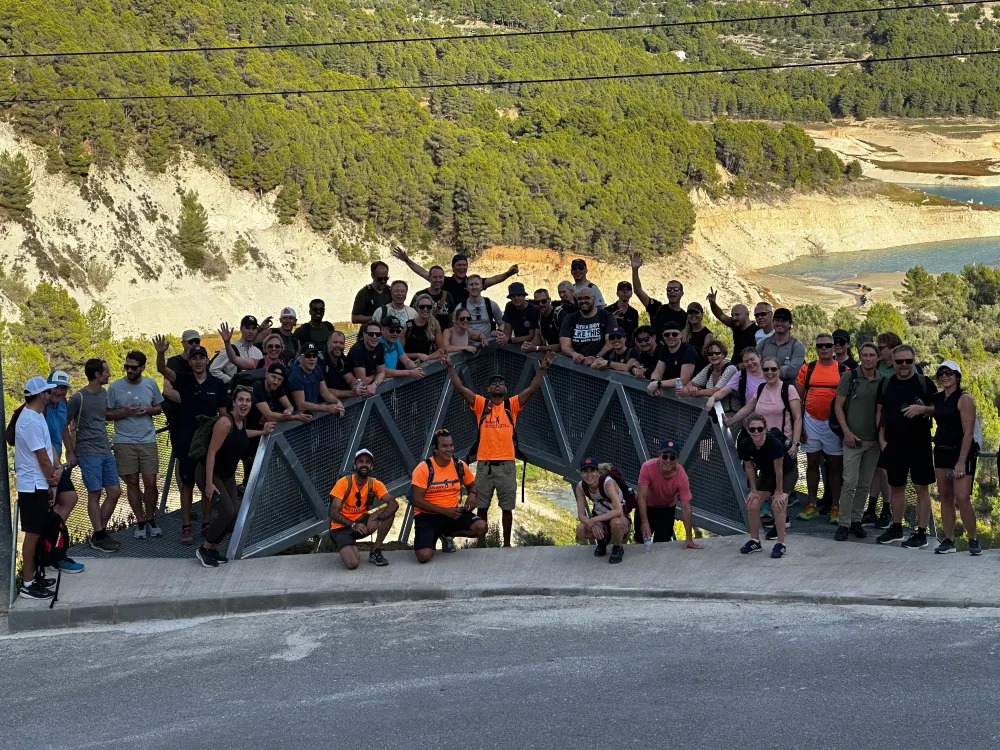 a group of people on a mountain road