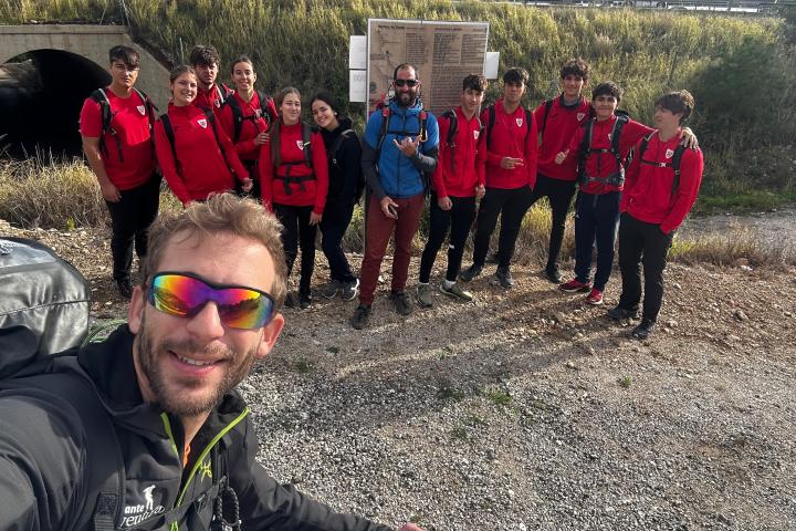 a group of people posing for the camera