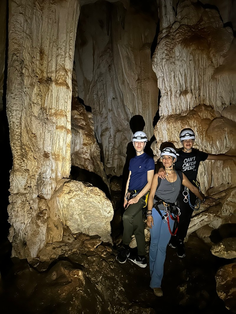 a man and a woman standing in front of a building