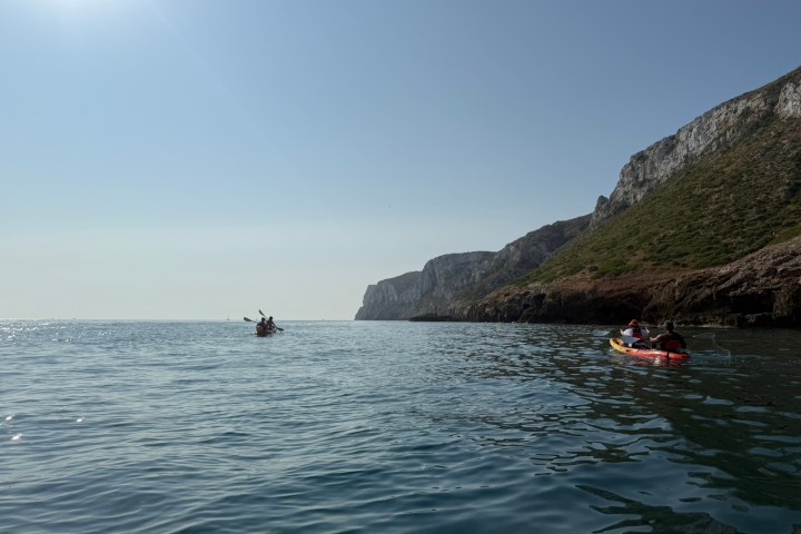 a small boat in a body of water